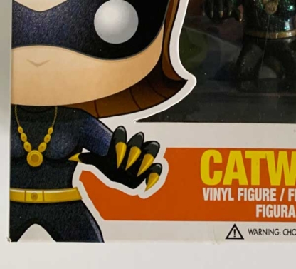 Catwoman Funko Pop bottom edge scratch